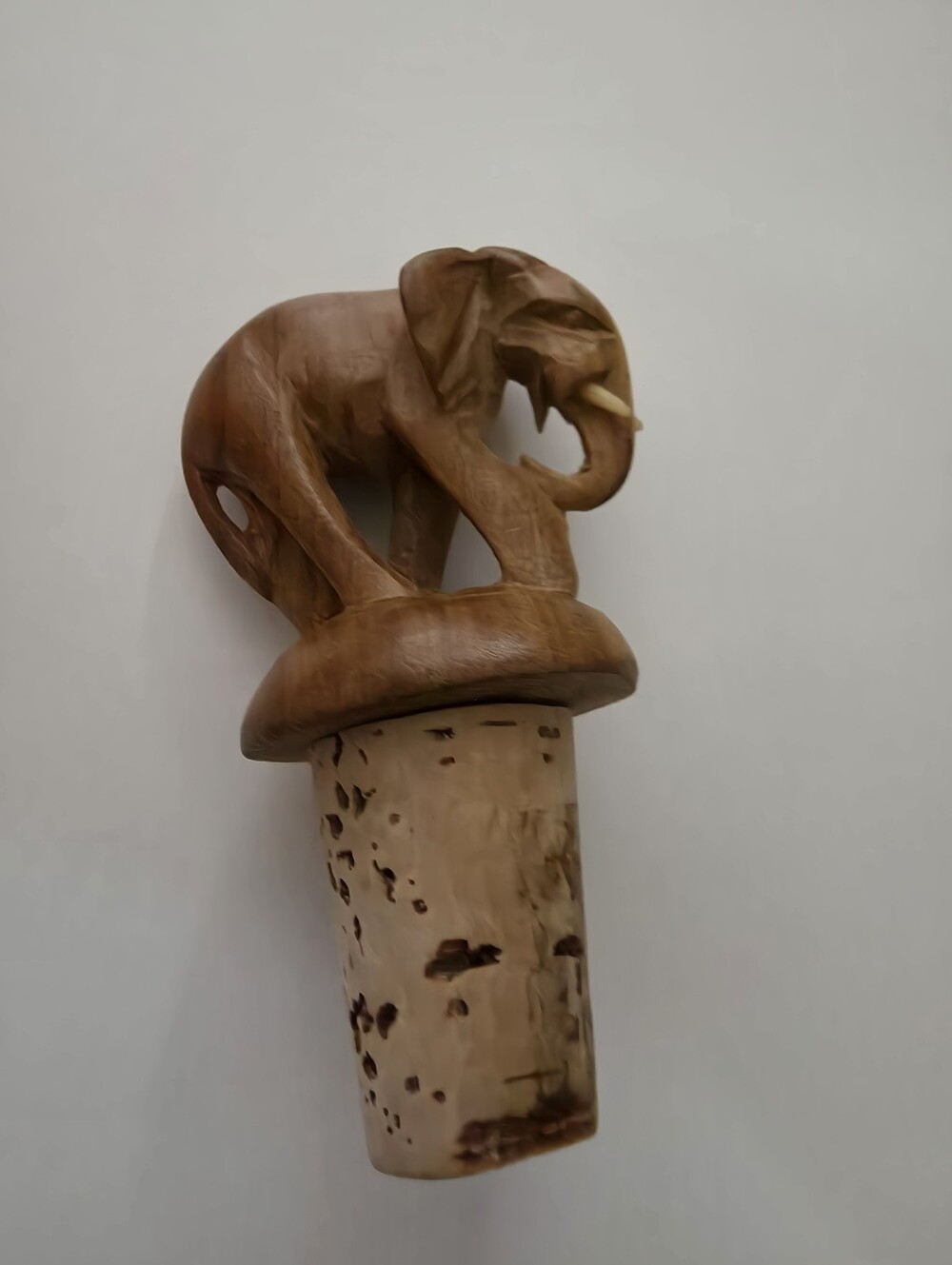 Hand-carved wooden elephant bottle stopper, carved elephant figure